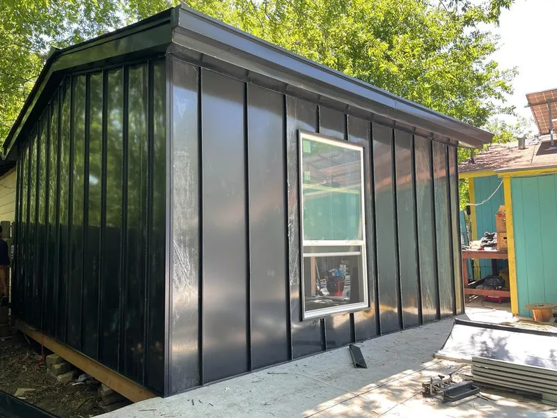 Black standing seam metal wall panels for Roof Inspection in Troutdale