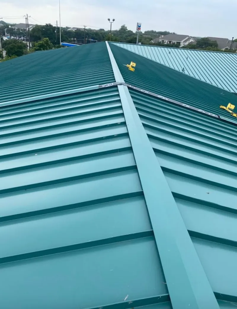 Green commercial metal roof ridge and valley for Metal Roof Repair in Troutdale